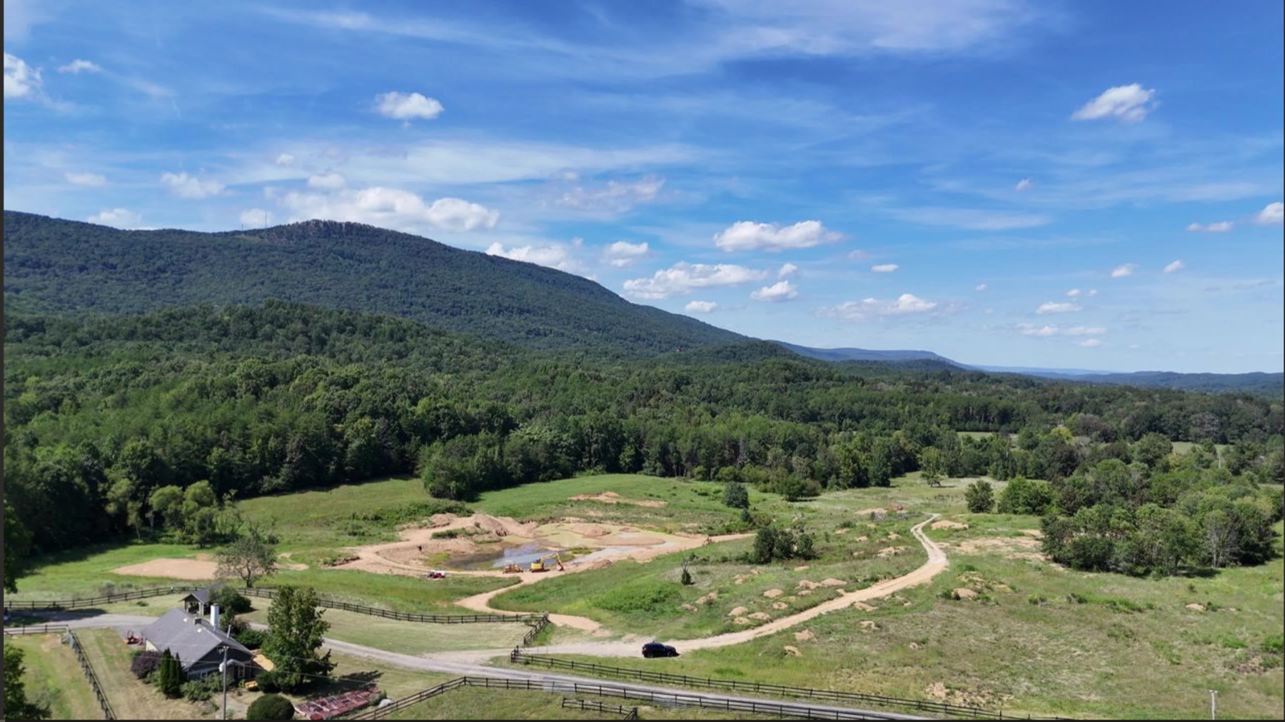 Open farmland and long mountain views in the Estates at Cloudland Station