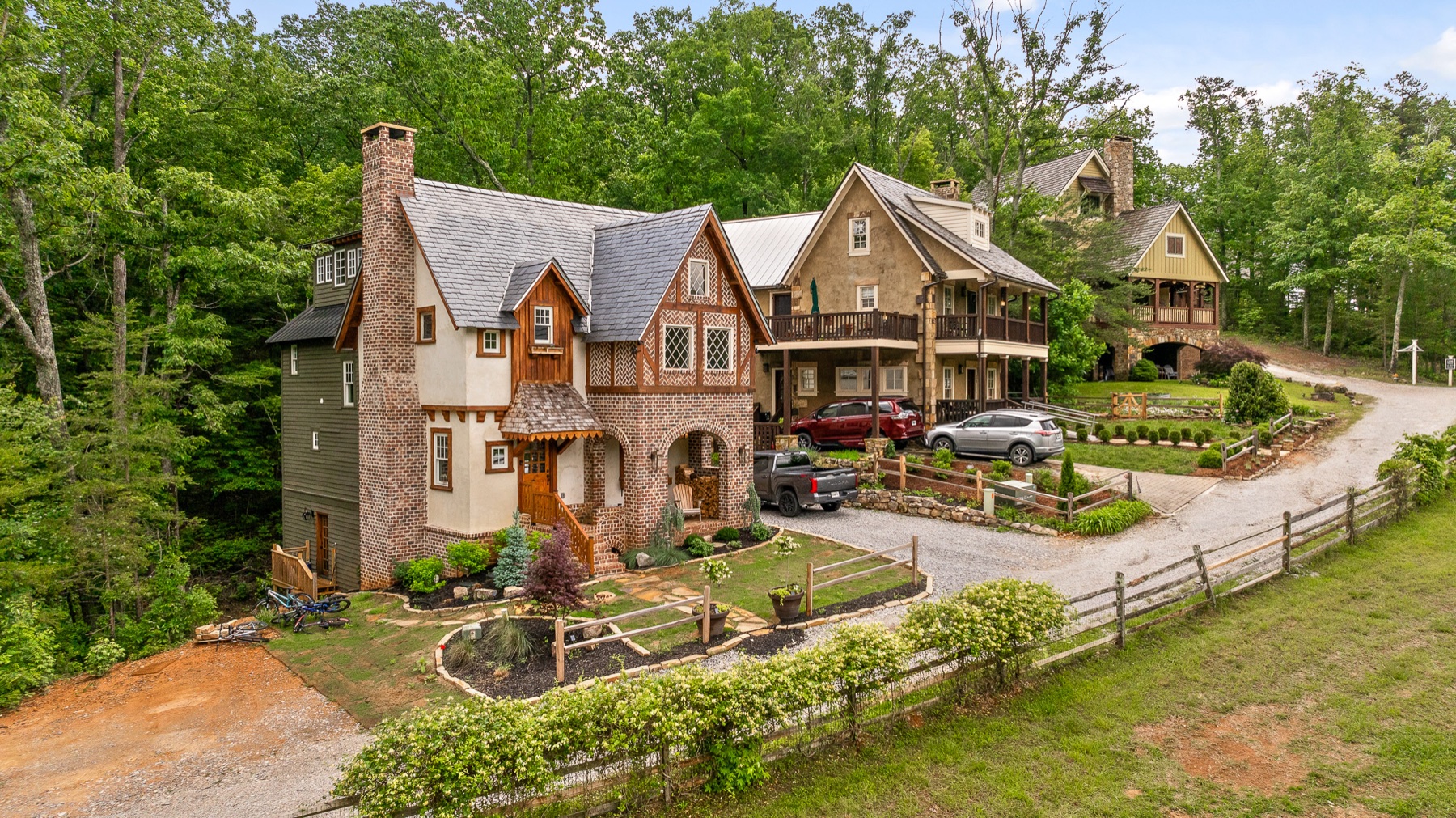 Architecturally distinct Cloudland Station homes gathered along a wooded lane